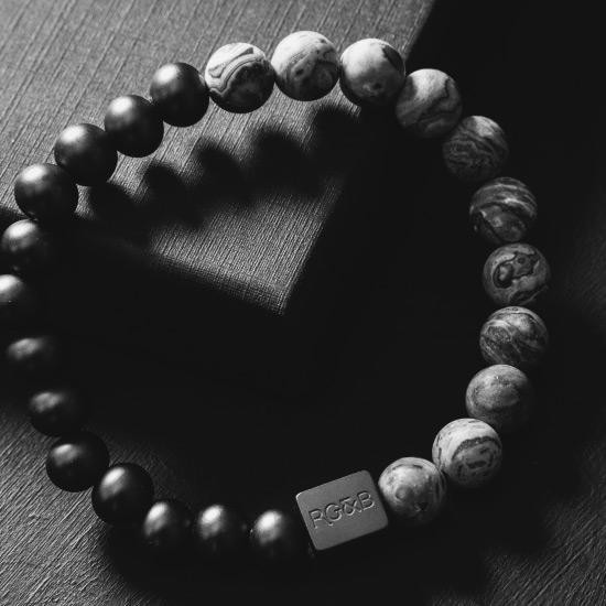 Grey Jasper Stone Bead Bracelet - Our Grey Jasper Stone Bead Bracelet Features 8mm Natural Stones, Premium Elastic Cord and Brushed Black Hardware. A Beautiful Addition to any Collection.